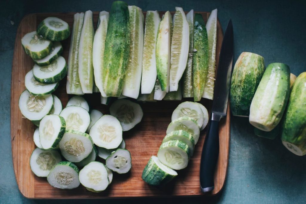 cucumbers beside silver knife